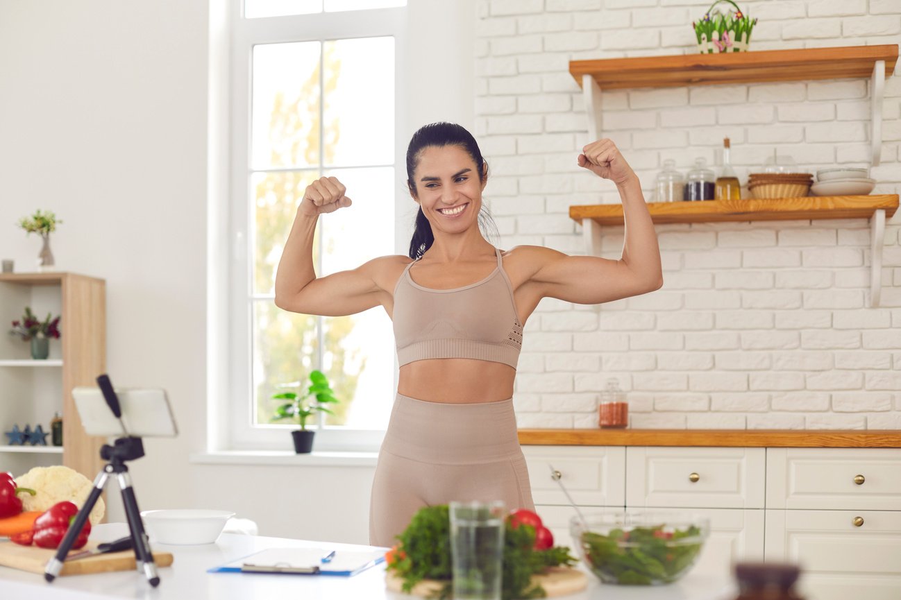 Fitness Coach Filming Video Where She Is Sharing Dieting Tips and Setting Healthy Lifestyle Example